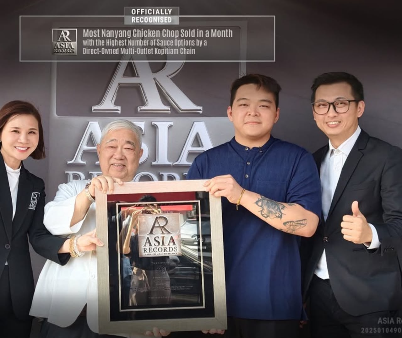 The UncleSam Kopi founding team receiving the Asia Records certification plaque