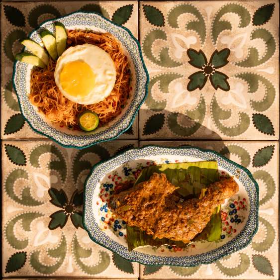 Nasi lemak plated on heritage tiles