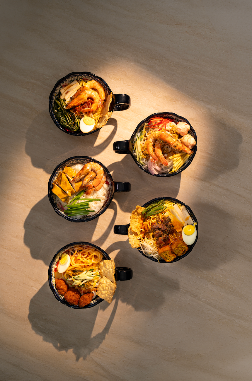 Noodle bowls served in enamel mugs