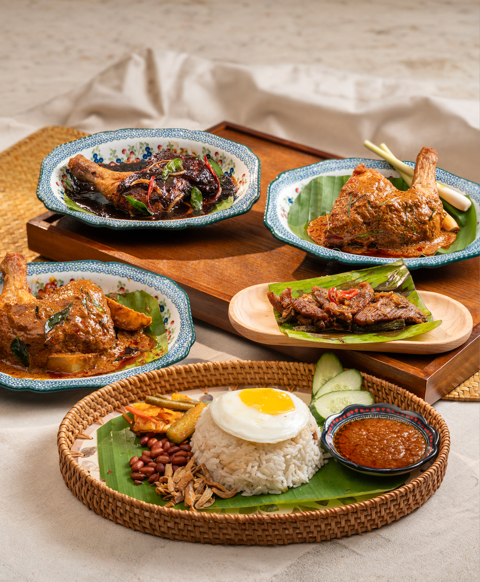 Rice plates with sambal, curry and fried chicken
